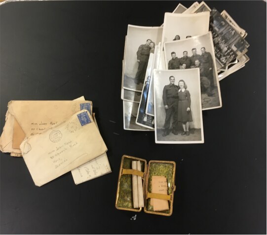 The photographs, letters and personal belongings discovered behind the organ screen