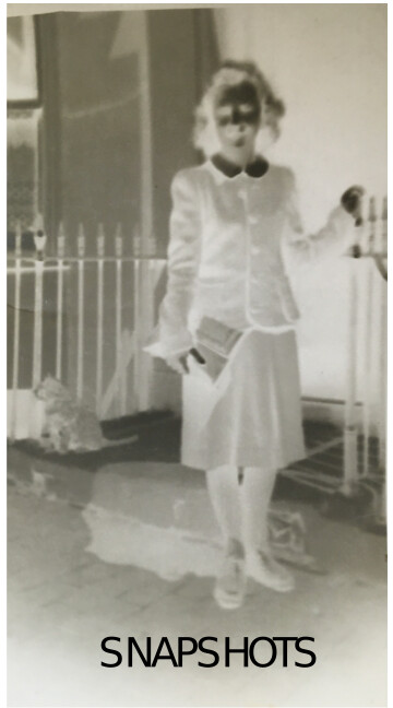 A negative-style photograph of a young woman, bearing the title Snapshots